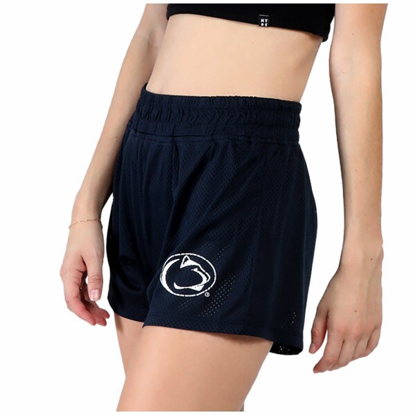 model wearing women's navy mesh track shorts with Penn State Athletic Logo on left thigh